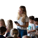 Bible Class teacher teaching kids in class about Jesus